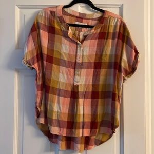 Short sleeve, loose fitting woman’s shirt